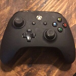 Black Controller with Ergonomic Design and Precision Control